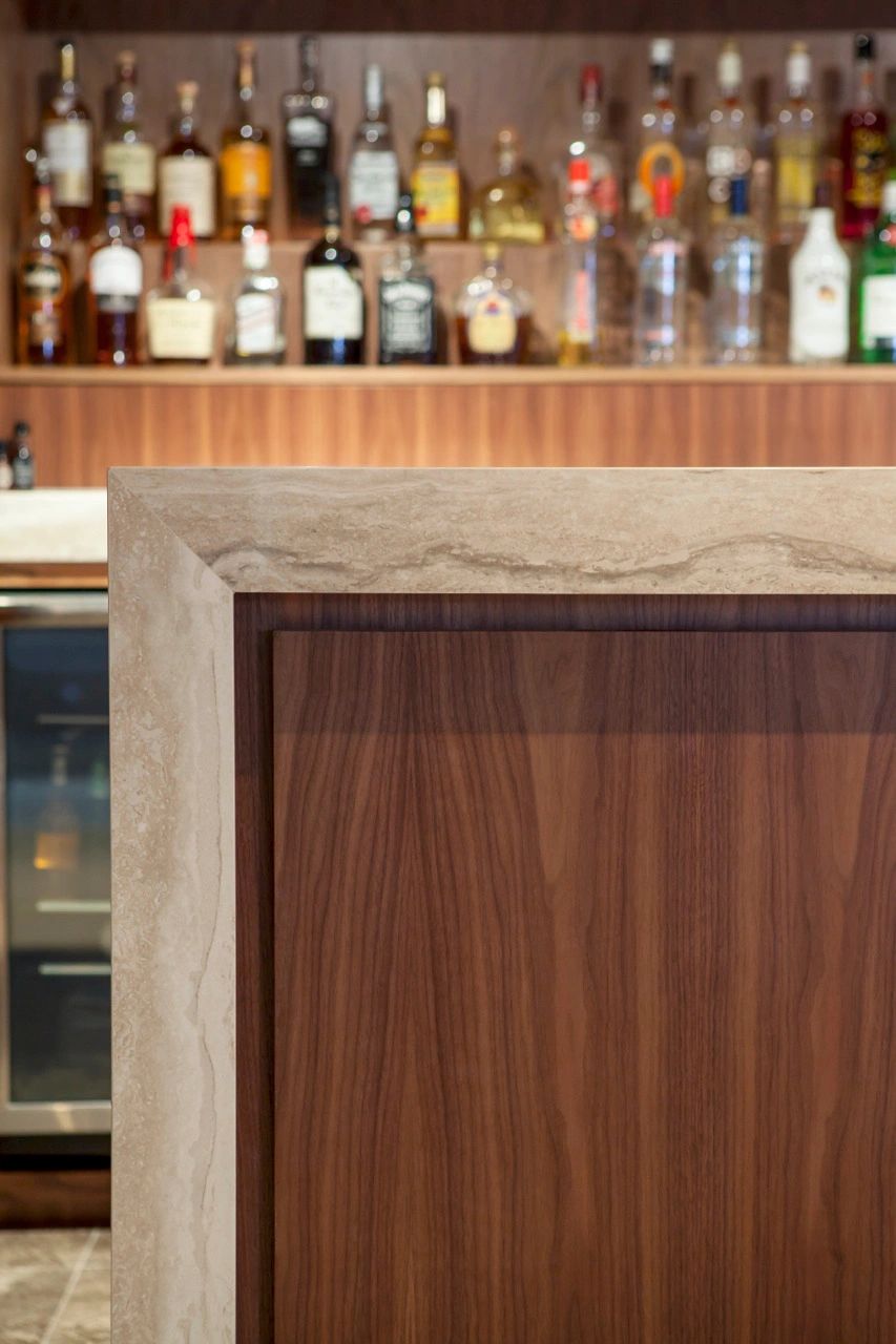 Bar counter stone top with wood paneling