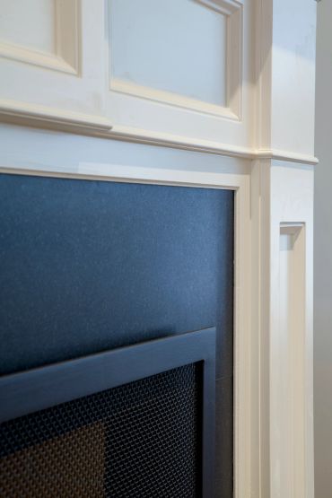 Wall detail with upholstered panel and architectural trim